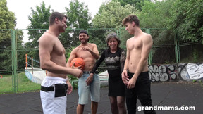 basketball video: Mature nympho Agatha seduces three guys on the basketball court