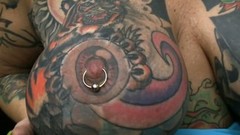 pierced pussy video: Tattooed Blackwidow gets her pierced pussy drilled