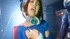 superhero video: Super hero is put on a torture machine and an alien hurts h