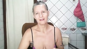 posing video: Solo granny is touching her body and rubbing pussy while posing in sexy lingerie