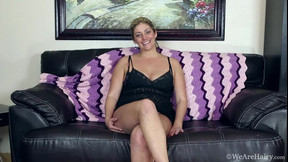 interview video: Alicia Silver introduces herself on a leather sofa