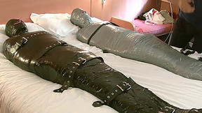 wrapped bondage video: Wrapped In Duct Tape And Encased In Rubber