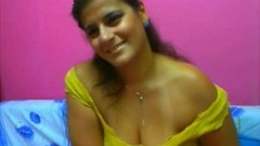 desi boobs video: Beautiful Siri Lankan milf with huge natural boobs and plump pussy teases her webcam