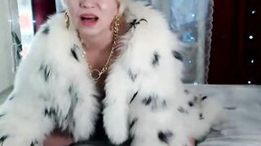 fur video: Super Russian cougar smokes into a fur coat and dominates))
