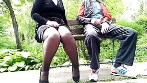 handjob and cumshot video: Unfamiliar MILF in pantyhose jerked off my cock in the park on a bench