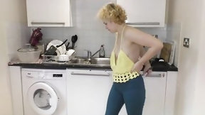 cleavage video: Delilah mops the kitchen floor and gives great downblouse view