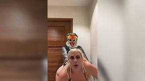 clown video: BBW MILF fucks with a creepy clown in a public restroom.