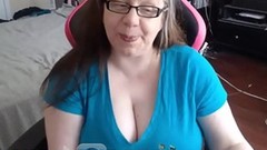 nerdy video: Mature nerdy MILF exposes her huge natural tits on a chair