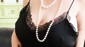 mature in solo video: Satin negligee and copper nylons