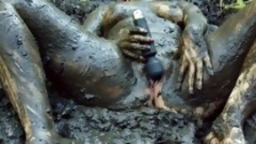 mud video: Red Riding Hood masturbates in forest mud