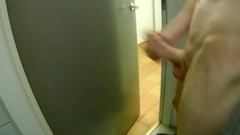 public toilet video: Unlocked door in public toilet. Sneaking around completely naked jerk off.