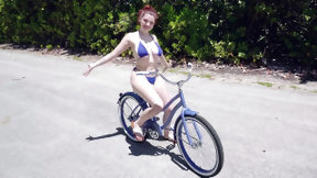 bicycle video: Annabel Redd is riding the bike and showing off her big boobs