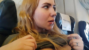airplane video: Handjob in the airplane with pretty blonde teen