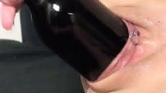 bottle video: Amateur slut devours a wine bottle and monster dildo