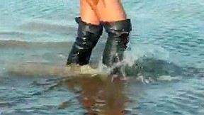 mud video: Black thigh high boots in the mud