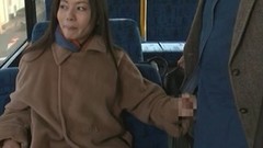 asian in public video: Fancy cougar dressed heavily giving a guy captivating handjob in the bus in reality shoot