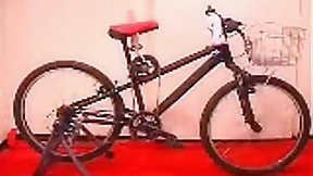 bicycle video: Asian girl tests out the dildo bicycle