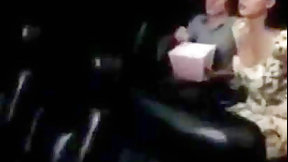 cinema video: Mom and son in movie theater