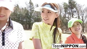 golf video: Cute Asian teen girls play a game of strip golf