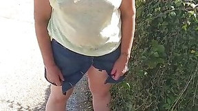 braless video: Braless Mature release piss in Public Park