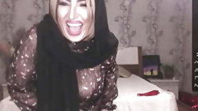 asian and arab video: An adult oriental woman caresses her body and shows her charms