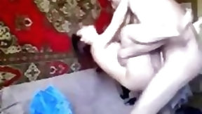 iranian video: Lusty Iranian babe rides a big long sword on sofa