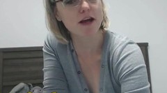 perky video: Perky little blonde with glasses.