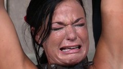 pain video: Black-haired cutie almost cries during the painful bondage treatment