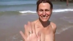 topless video: wife topless on beach with small empty saggy tits