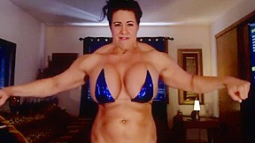 muscled video: muscle woman with big fake boobs