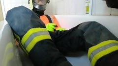 firefighter video: Piss / shower in black firefighter gear