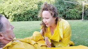 norwegian video: Cougar giving bj clothed into yellow LATEX Mac and Hunter boots