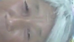 asian oldy video: gray-haired lady
