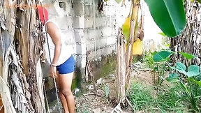 garden video: Horny woman is getting fucked from the back in the backyard, in the middle of the day