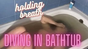 underwater video: Diving in bathtub and hold breath
