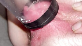 vacuum video: Clitoris blown by vacuum cleaner inside clear tube