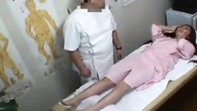 japanese doctor video: She puts on a gown and the doctor pulls it up to check her