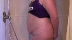 inflatable video: Cum Slut performs Enema Inflation in the shower