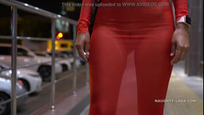 braless video: Red transparent dress in public
