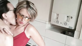 kitchen video: Blonde cougar is being fingered in the kitchen by a kinky stepson