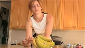 banana video: Horny Jodi masturbates with a banana in her kitchen