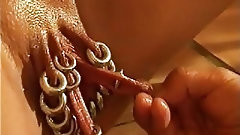 pierced pussy video: Pierced vagina is getting fisted in extremely hardcore way