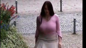 braless video: Busty girl walking, no bra, jiggling