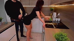 dress video: Hot woman is wearing nothing but a sexy, black dress while getting fucked in the kitchen