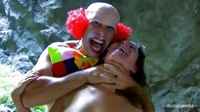 clown video: The clown is funny but he knows how to drill the brunettes