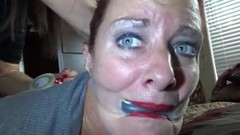 lesbian bdsm video: Lesbian femdom with busty redhead mature in bondage