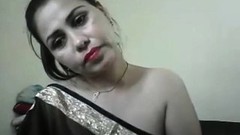 saree video: hot desi girl on cam showing boobs and teasing in a saree wi