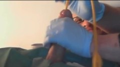 catheter video: hot guy has a friend insert a catheter