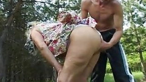 forest video: Mature Lady Lures Young boy Into The Woods