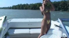 yacht video: Eve Angel the hot brunette with nice tits masturbates on a boat